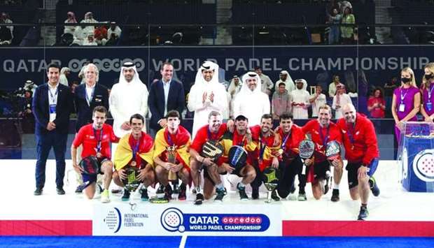 Spainu2019s menu2019s team celebrate with trophy after winning the Ooredoo Qatar Padel World Championship Saturday. The Qatar Tennis, Squash and Badminton Federation (QTSBF) president Nasser al-Khelaifi crowned the winners with International Padel Federation chief Luigi Carraro, Executive Vice President of Ooredoo Group Sheikh Mohamed bin Abdullah al-Thani and QTSBF Secretary-General Tariq Zainal attending the podium ceremony.