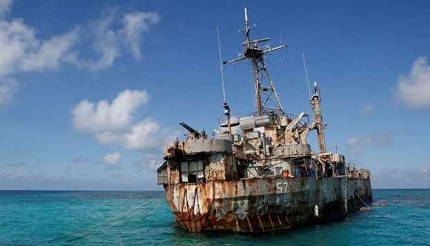 The BRP Sierra Madre, a marooned transport ship which Philippine Marines live on as a military outpost, is pictured in the disputed Second Thomas Shoal, part of the Spratly Islands in the South China Sea March 30, 2014. REUTERS
