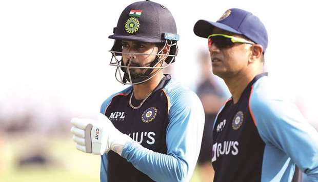 Indiau2019s batsman Shreyas Iyer (left) with coach Rahul Dravid during a training session in Kanpur yesterday.