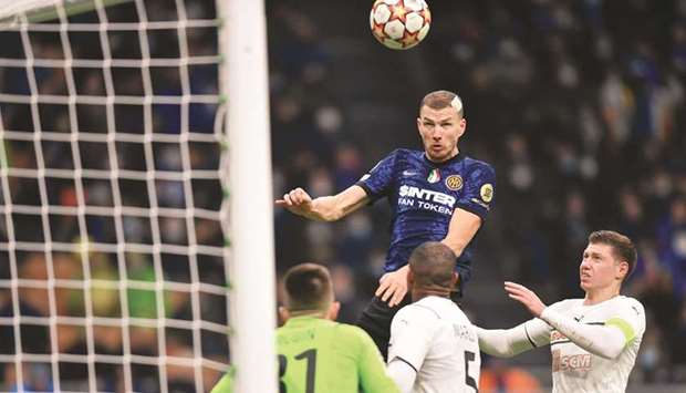 Inter Milanu2019s Edin Dzeko scores against Shakhtar Donetsk in Italy. (Reuters)