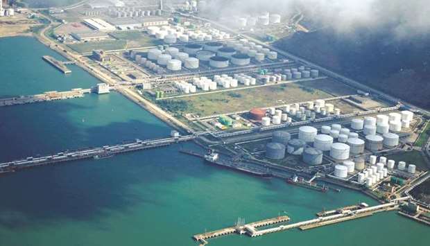 Oil and gas tanks are seen at an oil warehouse at a port in Zhuhai, China (file). China, the worldu2019s largest crude importer, was non-committal about whether it will release oil from its reserves as requested by Washington, while Opec sources said the US action has not made the producer group change course.