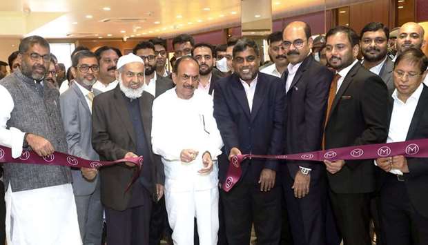 Dignitaries and officials at the inauguration of the store.