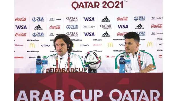 Saudi Arabiau2019s stand-in coach Laurent Bonadei (left) and striker Abdullah al-Hamdan at a press conference on Tuesday.