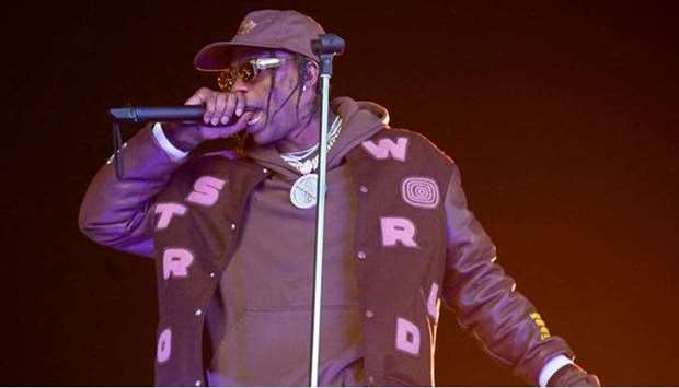 his file photo taken on November 9, 2019 shows Travis Scott performing during the Astroworld Festiva