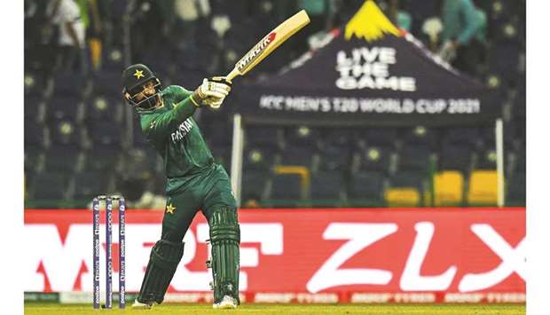 Pakistanu2019s Mohamed Hafeez plays a shot during the ICC Twenty20 World Cup match against Namibia in Abu Dhabi. (AFP)