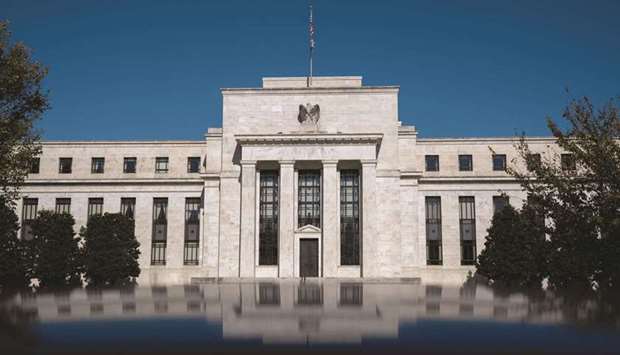 The Federal Reserve building in Washington, DC. Credit markets reacted favourably to the Fedu2019s announcement that it will begin tapering asset purchases this month with no rush to raise interest rates.