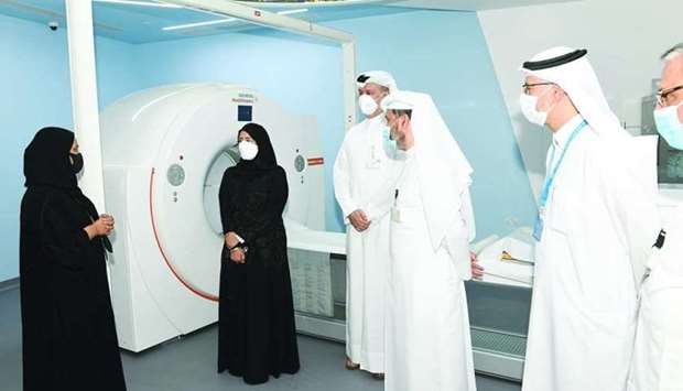 HE the Minister with HMC officials at the launch of the new services.