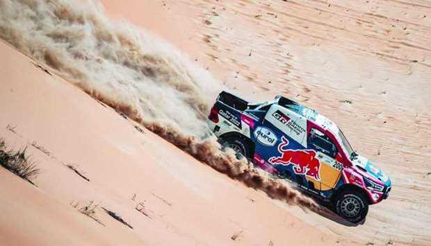 Nasser al-Attiyah set the fastest stage time for a second day running alongside Mathieu Baumel in a Toyota Hilux, at the Abu Dhabi Desert Challenge.
