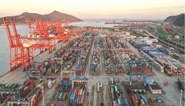 Containers stacked at Lianyungang port, in Chinau2019s eastern Jiangsu province. Outbound shipments jumped 27.1% in October from a year earlier, slower than Septemberu2019s 28.1% gain.
