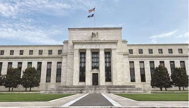 The Federal Reserve building in Washington, DC. The Fed is warning that prices of risky assets keep rising, making them more susceptible to perilous plunges if the economy takes a turn for the worse, and cited stablecoins as an emerging threat.