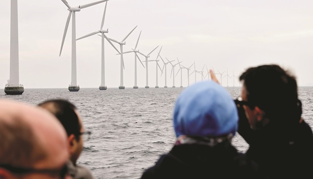 An offshore wind farm is pictured, outside Copenhagen, Denmark (file). Since 2004, almost $4.4tn of renewable energy assets have been financed, with most of that funding coming from long-term debt. Of that asset financing, more than $3.6tn flowed during the very low-interest-rate period of 2009 to 2021.