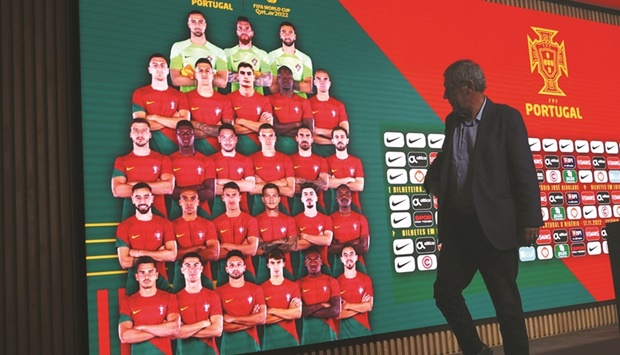 Portugal coach Fernando Santos walks past a screen displaying the squad after a press conference in Oeiras, Portugal, on Thursday. (Reuters)