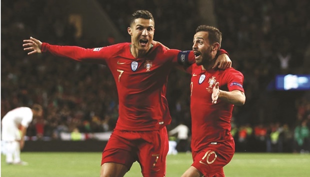 Despite failing to find the net in his last nine matches for Portugal, Cristiano Ronaldo (left) still has the backing of his teammates, says Bernardo Silva.