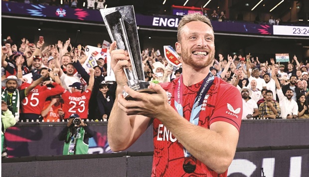 Englandu2019s Jos Buttler celebrates with the trophy in the ICC Twenty20 World Cup 2022 final against Pakistan at the Melbourne Cricket Ground in Melbourne on Sunday. (AFP)