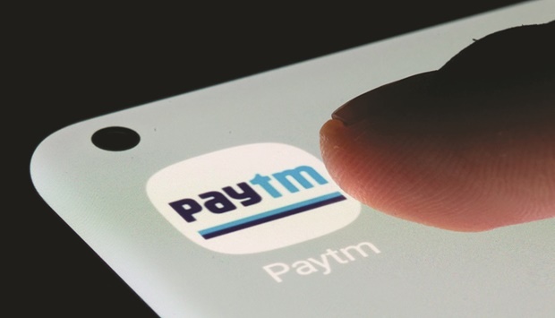 Paytm app is seen on a smartphone in an illustration. The companyu2019s shares fell just over 1% to 630.8 rupees yesterday, far below its IPO price of 2,150 rupees a share. Its market value is about $5bn, more than $10bn less than its peak.