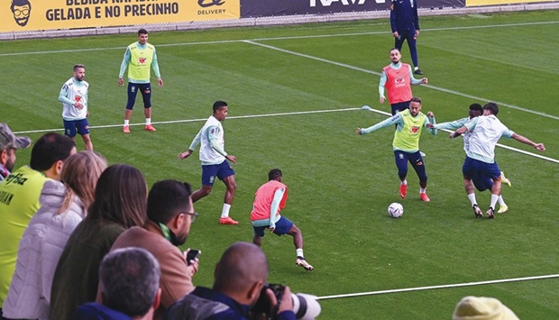 Brazil players in action during a training session at the Continassa training ground in Turin yesterday. (AFP)