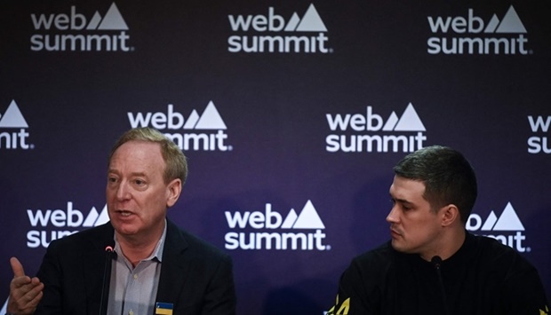 Microsoft's Vice Chair and President Brad Smith (L) and Ukrainian Vice Prime Minister and Minister of Digital Transformation Mykhailo Fedorov (AFP)