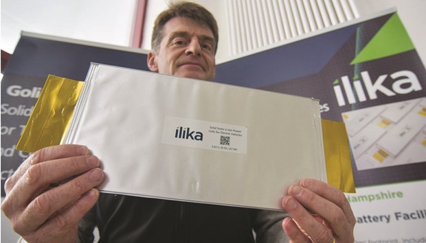 Solid-state battery maker Ilika chief executive Graeme Purdy holds up a prototype electric vehicle battery developed as part of the startupu2019s u201cGoliathu201d project, in Romsey, Britain. Europeu2019s drive to build a homegrown electric vehicle battery industry is hitting roadblocks as investors shy away from giving startups sufficient funding to challenge the Asian companies that dominate the market.