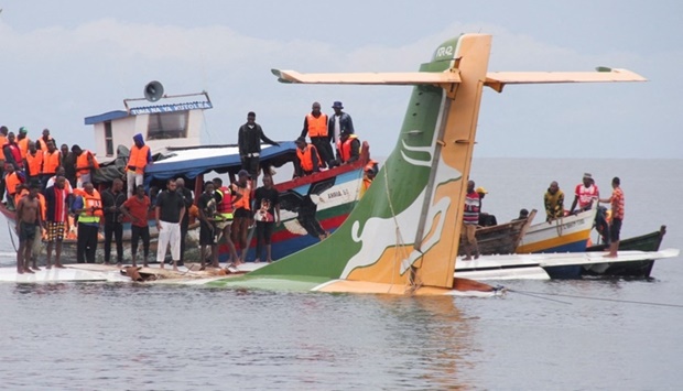 Rescuers attempt to recover the Precision Air passenger plane that crashed into Lake Victoria in Bukoba, Tanzania. REUTERS