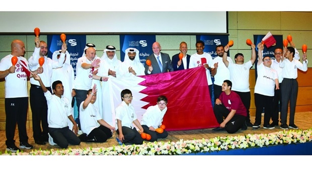 HE Hassan al- Thawadi, Gianni Infantino and other dignitaries along with students from Shafallah Center at the event. PICTURE: Thajudheen
