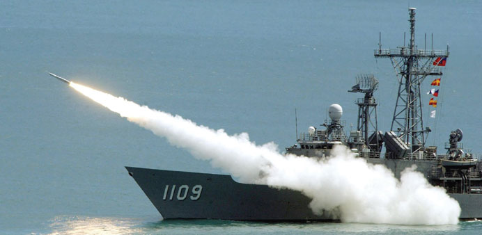 This 2003 file photo shows a Standard surface-to-air missile being launched from a Perry-class frigate of the Taiwan navy during wargames in the water