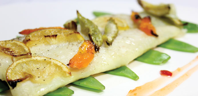 Steamed halibut with herbs.