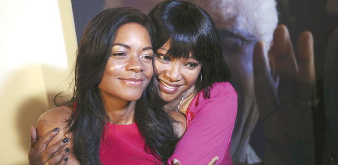Cast member Naomie Harris (L), who plays the role of Winnie Mandela, poses with Zindzi Mandela, daughter of anti-apartheid leader and former president