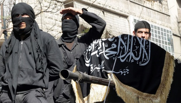 Members of Al-Nusra Front take part in a parade calling for the establishment of an Islamic state in Syria. File picture.