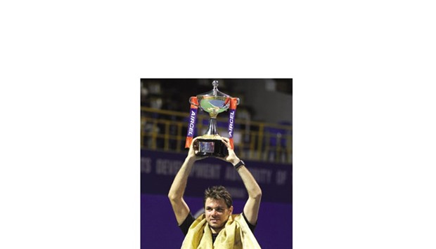 Stan Wawrinka of Switzerland poses with his trophy after beating Borna Coric of Croatia in the final of the Chennai Open yesterday.