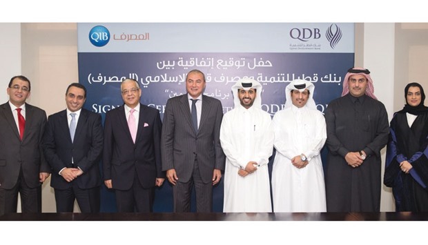 QIB and QDB officials after signing the agreement. Al Dhameen has contributed to an ever-evolving Qatari private sector, with a record QR846mn in guarantees to over 348 SMEs, since its initiation in 2010. Over QR569mn has been cashed already.