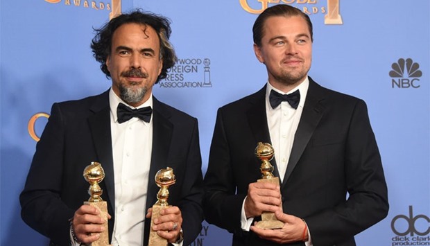 Director Alejandro Gonz?lez I??rritu (L) poses with award for Best Director and Best Motion Picture and actor Leonardo DiCaprio poses with the award for Best Actor in a Motion Picture, Drama, for u201cThe Revenant,u201d in the press room at the 73nd annual Golden Globe Awards, January 10, 2016, at the Beverly Hilton Hotel in Beverly Hills, California.