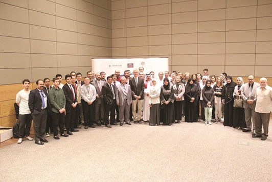 Professor Wolfgang Ketterle, winner of the 2001 Nobel Prize in Physics, alongside participants from the u2018Ibn Al-Haytham Daysu2019 event.