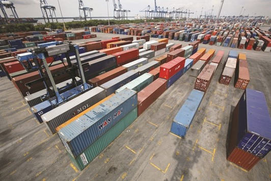 A container yard at North Port in Port Klang outside Kuala Lumpur. Moodyu2019s Investors Service yesterday cut Malaysiau2019s outlook on the A3 sovereign rating to stable from positive.