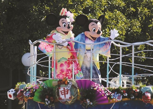 Disney characters Mickey (right) and Minnie Mouse