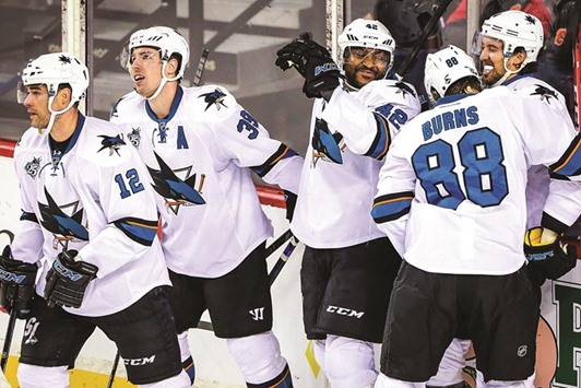 San Jose Sharks right wing Joel Ward (No 42) celebrates his goal with teammates against the Calgary Flames during the third period at Scotiabank Saddledome. PICTURE: USA TODAY Sports