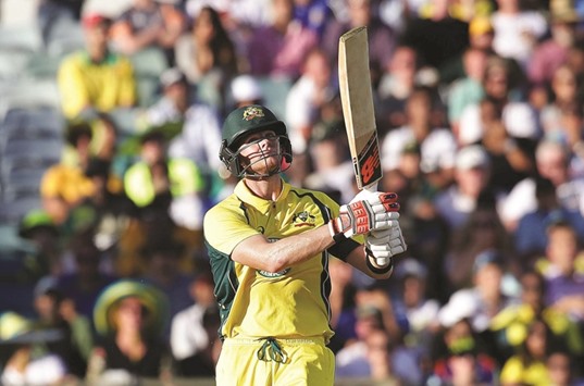 Aussie captain Steven Smith clouts a six against India to help his team sail past Indiau2019s 309.