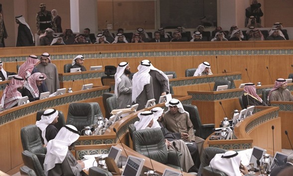 Kuwaiti MPs attend a parliament session at Kuwaitu2019s National Assembly yesterday. The parliament debates a government request for an additional $20bn funding for defence and considers questioning Health Minister Ali al-Obaidi over allegations of financial and administrative violations.