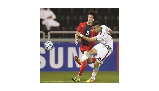 Iranu2019s Arsalan Motahhari (right) in action during the match against Syria yesterday.