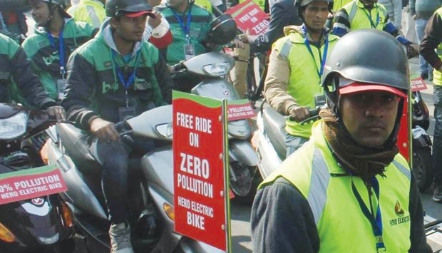 Civil defence volunteers use electric bikes to spread the message on day 1 of the implementation of the governmentu2019s odd-even formula in New Delhi yesterday.