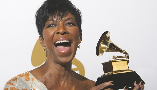 A file picture taken on February 8, 2009, shows singer Natalie Cole with the Grammy award for the Best Traditional Pop Vocal Album during the 51st annual Grammy in Los Angeles.