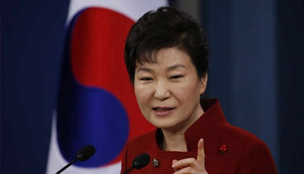 South Korea's President Park Geun-hye answers a reporter's question during her New Year news conference at the Presidential Blue House in Seoul