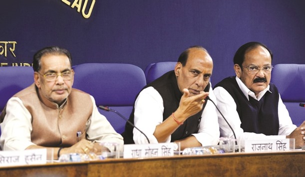 Home Minister Rajnath Singh (centre) speaks at a press conference as Urban Development Minister M Venkaiah Naidu (right) and the Agriculture Minister Radha Mohan Singh look on in New Delhi yesterday.