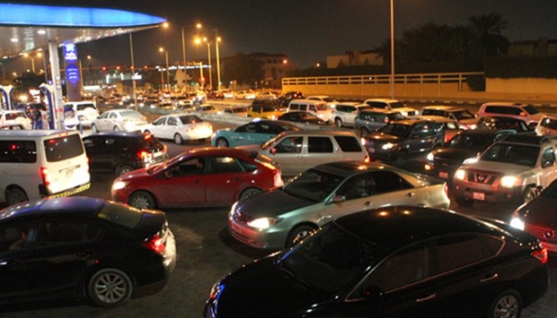 Long lines of vehicles overflowing on to the streets were seen at fuel stations in Doha evening after Qatar Fuel (Woqod) hiked gasoline prices with effect from midnight.  PICTURE: T K Nasar
