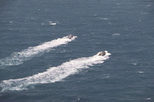 A handout picture released by the news website and public relations arm of Iranu2019s Revolutionary Guards, Sepah News, shows US navy patrol boats sailing after their release by Iranian authorities.