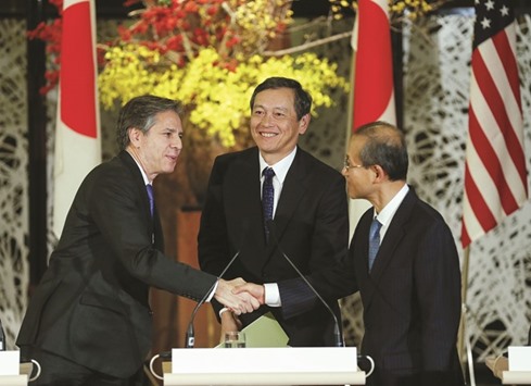 US Deputy Secretary of State Antony Blinken (left), Japanese Vice Foreign Minister Akitaka Saiki (centre) and First Vice Minister of Foreign Affairs of South Korea Lim Sung Nam conclude a joint news conference at the Japanese Foreign Ministry in Tokyo yesterday.