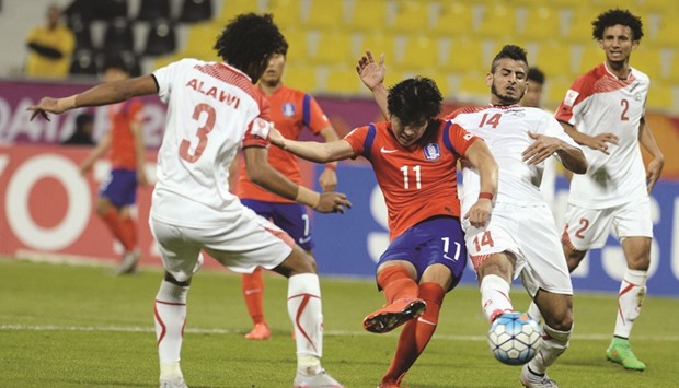 South Koreau2019s Kim Seung Jun shoots to score against Yemen during the AFC U-23 Championship.
