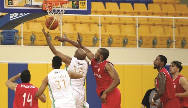 Action from the Qatar Basketball League match between Al Shamal and Al Ahli at the Gharafa Indoor Hall yesterday. Shamal won 90-67. (Below) Al Gharafa defeated El Jaish 77-67 in the second match of the day. PICTURES: Othman Iraqi