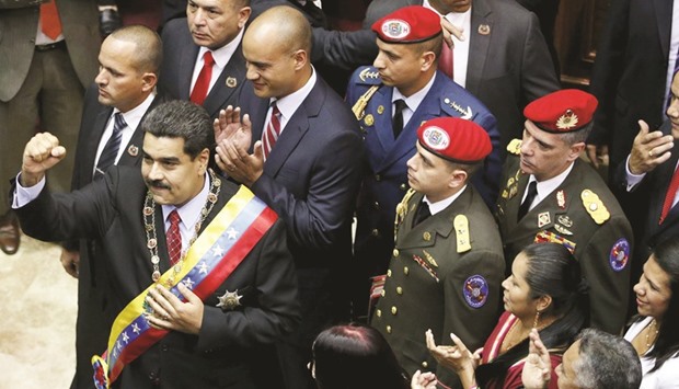 Venezuelau2019s President Nicolas Maduro gestures ahead of his annual State of the Nation address at the National Assembly in Caracas on Friday.