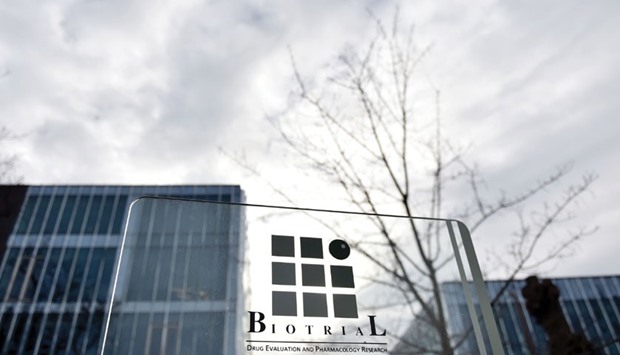 A picture taken yesterday shows the logo of the Biotrial laboratory on its building in Rennes, western France, where a clinical trial of an oral medication left one person brain-dead and five hospitalised.