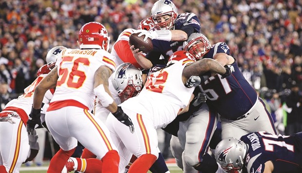 New England Patriots quarterback Tom Brady dives for a touchdown during the second quarter against the Kansas City Chiefs in the AFC Divisional round playoff game at Gillette Stadium. PICTURE: USA TODAY Sports